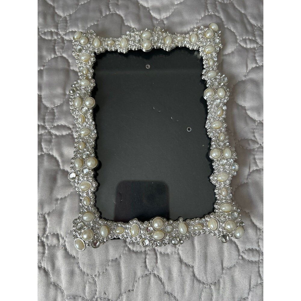 Silver tone picture frame is the perfect embellishment for a wedding photo